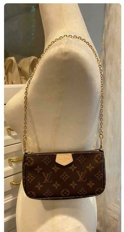 mini pochette louis vuitton size|louis vuitton escale mini pochette.